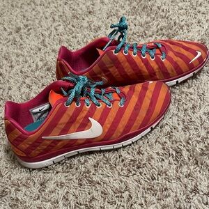 Nike Women's Red and Orange Striped Athletic Shoes